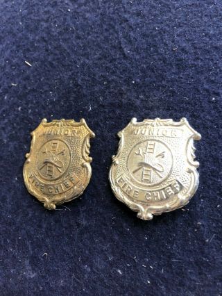 (2) Vintage Tootsietoy Junior Fire Chief Badges Silver & Gold Colored