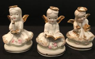 Vintage Japan Angel Trio Porcelain Figurines Candle Hymn Book Star