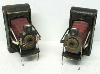 (2) Kodak 1a Folding Pocket Cameras Red Bellows Wood,  Shutters 1905 - 15
