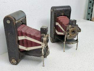(2) KODAK 1A FOLDING POCKET Cameras RED BELLOWS wood,  shutters 1905 - 15 2