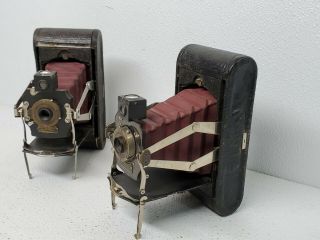 (2) KODAK 1A FOLDING POCKET Cameras RED BELLOWS wood,  shutters 1905 - 15 3