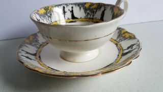Paragon Star Symbol Tea Cup and Saucer Yellow with Silhouette Vintage 3