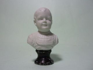 Antique Miniature Bisque Porcelain Bust Of A Child,  Signed.