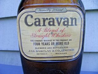 Vintage,  Caravan whiskey bottle.  1 Pint bottle,  (empty) Detroit,  Michigan.  1940 ' s 2