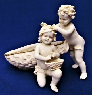 Antique German? Bisque Porcelain Nude Boy & Girl Fixing Hair Baskets Figurine