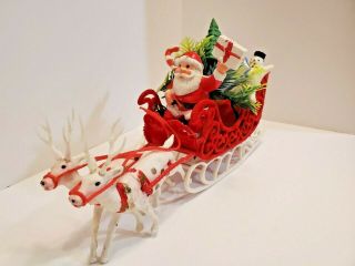 Vintage 1950 - 60’s Plastic Santa,  Tree,  & Gifts In Flocked Sleigh With 2 Reindeer