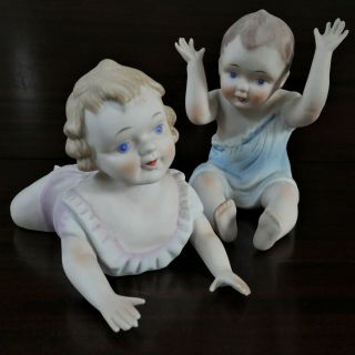 Vintage Porcelain Boy And Girl Piano Babies