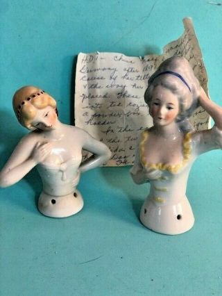 2 Antique Vintage Germany Colonial Girl Porcelain Pin Cushion Half Doll History