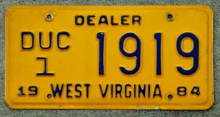 1984 Blue On Orange West Virginia Car Dealer [duc] License Plate