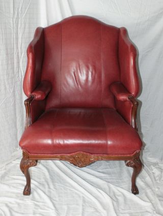 Fabulous Unique High Wingback Burgundy Leather With Dark Ornate Carved Wood Trim