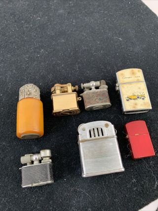Group Of 7 Vintage Miniature Pocket Lighters