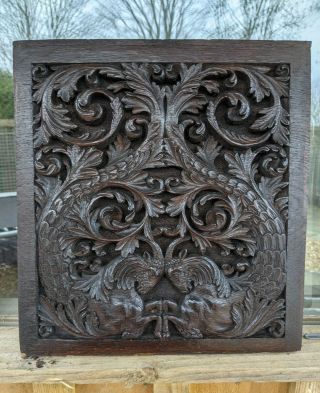 Fine 17th Century Carved Oak Panel Of Aries With Green Man Hiding Above