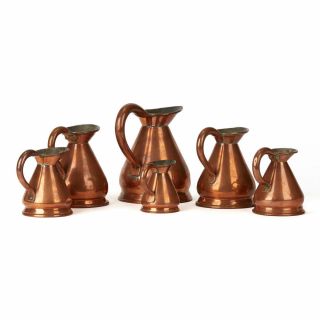 SIX VINTAGE GRADUATED COPPER MEASURING JUGS EARLY 20TH C. 2