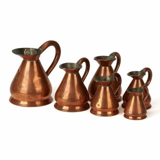 SIX VINTAGE GRADUATED COPPER MEASURING JUGS EARLY 20TH C. 3