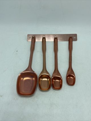 Aluminum Copper Color Measuring Spoons Set Of 4 With Hanging Bar Vintage