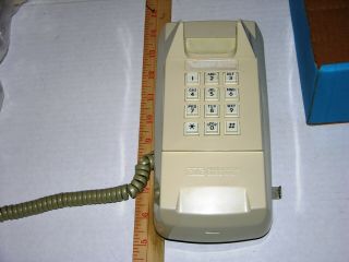 Vintage Wall Mount Push Button Touch Tone Phone GTE Ivory factory reconditioned 2