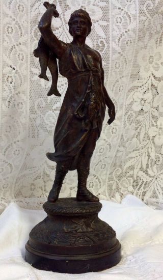Antique Bronzed Spelter Figure Of Fisher Man With Fish Standing On Wood Plinth