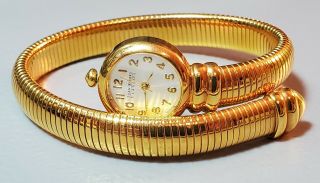 Vintage Joan Rivers Classics Gold Tone Coiled Snake Band Fashion Wristwatch