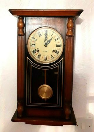 Antique 31 Day Wall Clock With Pendulum.