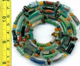 Roman Ancient Blue Glass Beads Encrusted Heishi Baltic Amber Centuries Old 32 