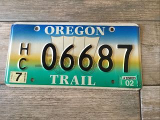 Oregon Trail Graphic License Plate Exp 02 Hc Covered Wagon Very Decent