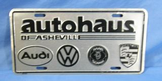 Autohaus Asheville Vw Saab Porsche Dealership License Plate Metal Embossed Ad.