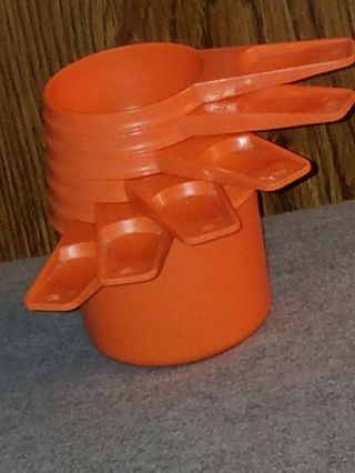 Set Of (6) Vintage Tupperware Orange Nesting Measuring Cups