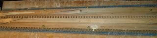 COMPLETE SET OF BRASS REEDS FROM ANTIQUE BECKWITH PUMP ORGAN IN BOARD 2