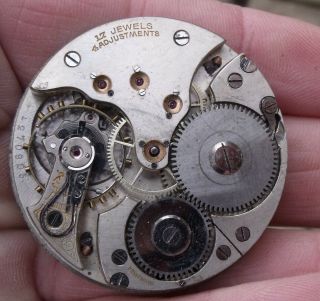 An Antique Swiss Pocket Watch Movement,  17 Jewels,  4 Adjustments.
