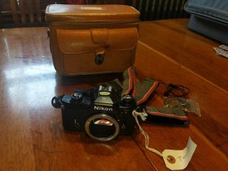 Nikon Em 35mm Slr Film Camera Body With Vintage Carrying Case And Cleaning Kit