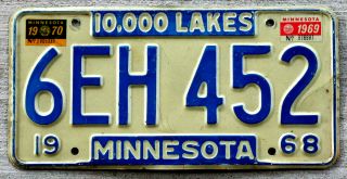1968 Blue On White Minnesota License Plate With A 1969 And 1970 Stickers
