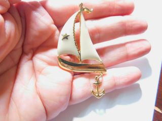 Cream Enamel Gold Tone Metal Nautical Sail Boat Anchor Dangle Brooch Vintage