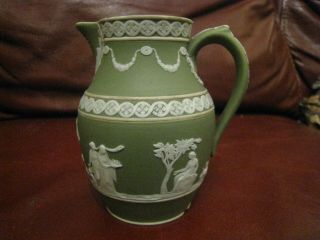 Antique 19th Century Wedgwood Jasper Ware Jug With Olive Green Ground.