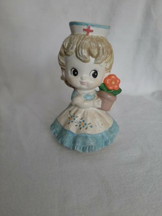 Vintage Ceramic Nurse Girl Holding Flower In Pot Figurine 4.  5 "