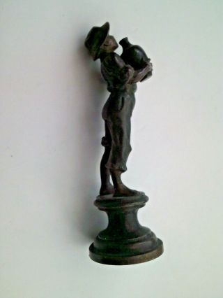An Early 20th Century Bronze Figure Of A Boy Holding A Vase Possibly Austrian