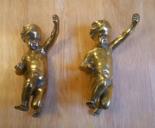 Identical Solid Cast Brass Cherub/cupid/putti.  Kneeling.