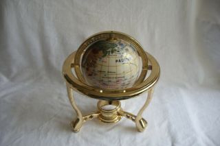 Semi Precious Stone Rotaing World Globe On A Brass Effect Frame.