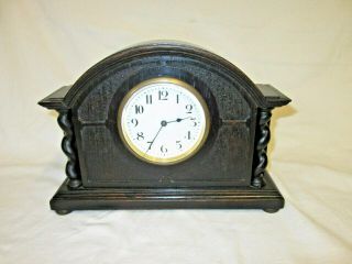 An Early 20th Century Oak Mantel/ Timepiece Clock
