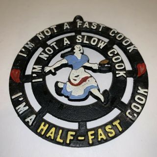 Vintage Cast Iron Trivet I’m Not A Fast Cook I’m Not A Slow Cook.  Usa 5”