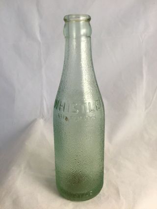 Vintage Whistle 6 1/2 Fld.  Ozs.  Light Green Glass Soda Bottle.  Leavenworth Ka 26