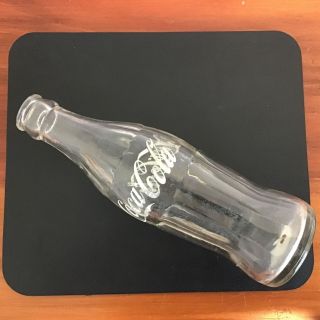 Vintage.  Coca Cola Glass Bottle.  Min Contents 6 Fl Oz.  19cm Tall.  Trade Mark 209