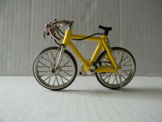 Vintage Die Cast Yellow Metal Bicycle With Wheels