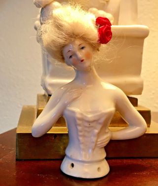 Vintage/Antique porcelain/bisque pin cushion half doll with hair 3”tall 3