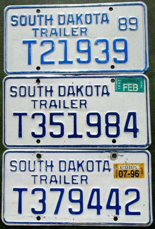 3 South Dakota Trailer License Plates - 1989,  1995 & 1996