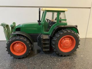 Vintage Farm Tractor With Driver Farmer Green Friction Powered.  Toy