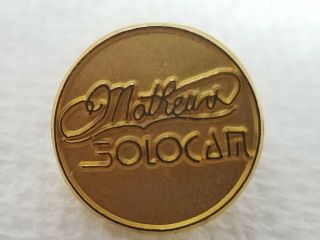 Vintage Gold Colored Metal Mathews Solocam Pin