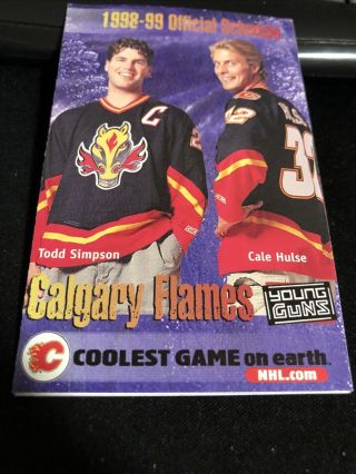 1998 - 99 Calgary Flames Hockey Pocket Schedule Saddledome Version Cale Hulse