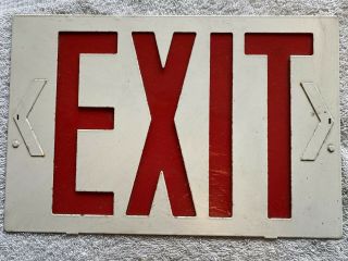 Vintage Metal Red Exit Sign Illuminates Translucent Red Letters