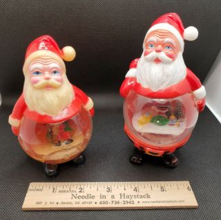 Two Vintage Hard Plastic Santa Claus Snow Globe