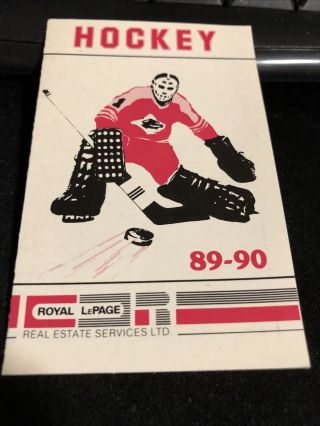1989 - 90 Calgary Flames Hockey Pocket Schedule Royal Lepage Real Estate Version